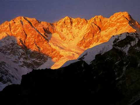 
Kangchenjunga Southwest Face at sunset from Oktang - Climbing The Worlds 14 Highest Mountains book
